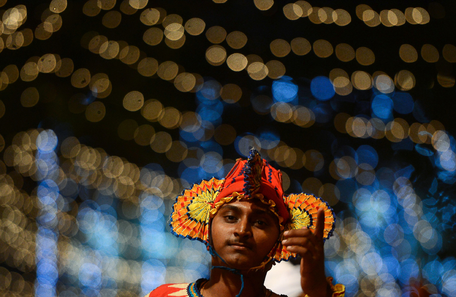 Buddhist monks take part in a procession in front of the Gangarama Temple. PHOTO: AFP