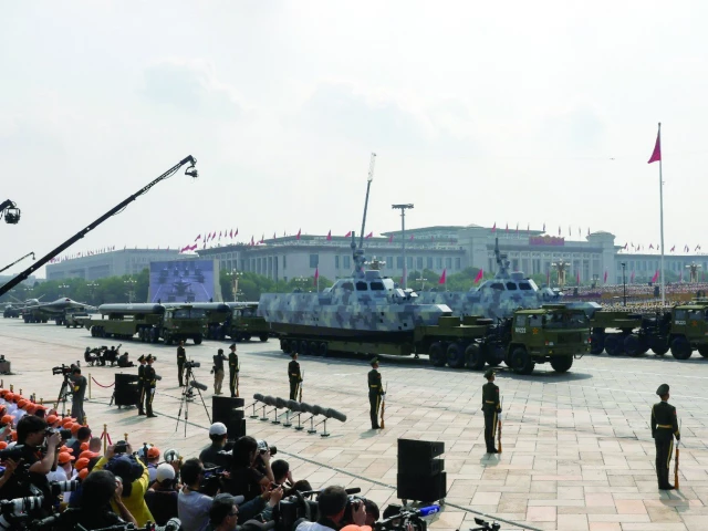 members of the people s liberation army stand as unmanned maritime drones are displayed during a military parade to mark the 80th anniversary of the end of world war two in beijing china photo reuters members of the people s liberation army stand as unmanned maritime drones are displayed during a military parade to mark the 80th anniversary of the end of world war two in beijing china photo reuters