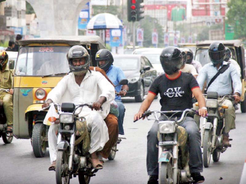 traffic police officials warned motorcyclists on monday to ensure they wore helmets or they will be fined as the helmet compulsory campaign will start in full swing from today tuesday photo online