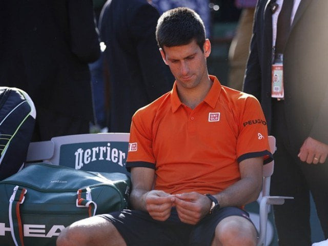 serbia 039 s novak djokovic reacts after his match against switzerland 039 s stanislas wawrinka at the end of their men 039 s final match of the roland garros 2015 french tennis open in paris on june 7 2015 photo afp serbia 039 s novak djokovic reacts after his match against switzerland 039 s stanislas wawrinka at the end of their men 039 s final match of the roland garros 2015 french tennis open in paris on june 7 2015 photo afp