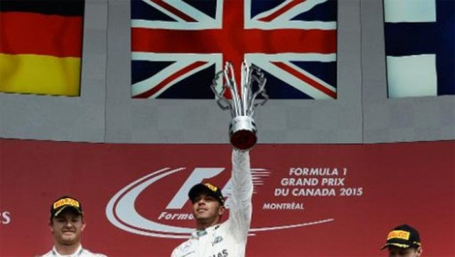 british driver lewis hamilton celebrates victory at the canadian grand prix on june 7 2015 photo afp