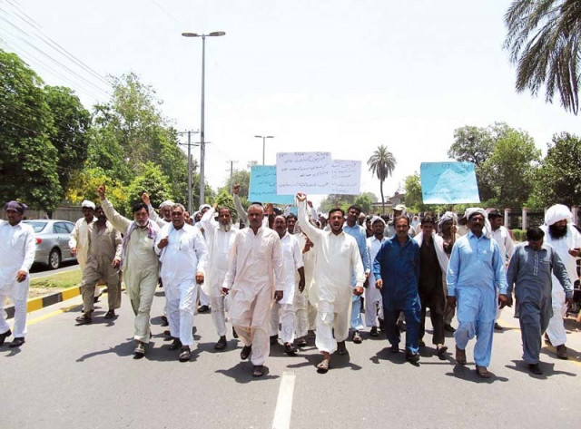 residents of irrigation colony march to zila council chowk demanding removal of land grabber from their residential area photo online residents of irrigation colony march to zila council chowk demanding removal of land grabber from their residential area photo online