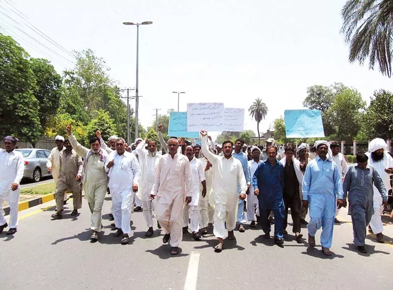 residents of irrigation colony march to zila council chowk demanding removal of land grabber from their residential area photo online residents of irrigation colony march to zila council chowk demanding removal of land grabber from their residential area photo online