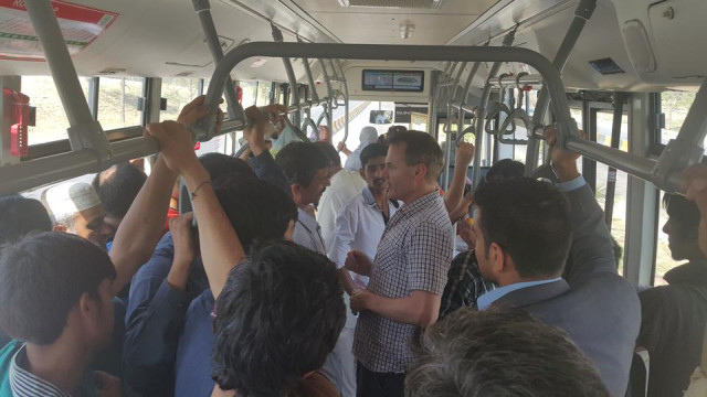 danish ambassador jesper m ller s rensen riding the metro bus in islamabad photo embassy of denmark in pakistan