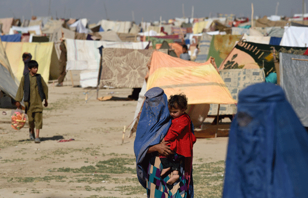 kunduz is facing a humanitarian crisis with thousands of families trapped in a vortex of violence photo afp kunduz is facing a humanitarian crisis with thousands of families trapped in a vortex of violence photo afp
