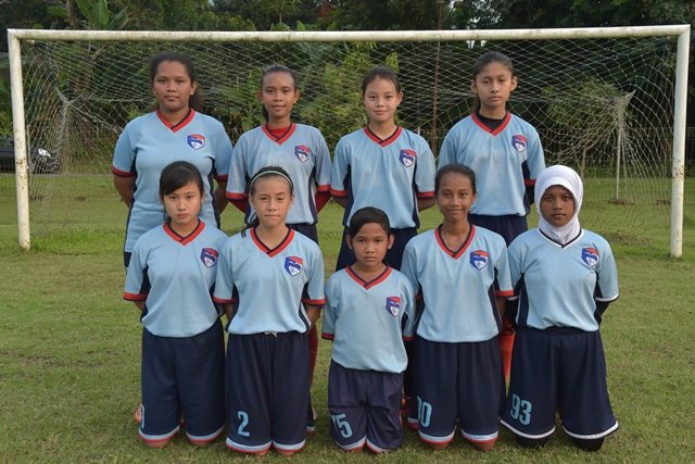 this picture taken on april 15 2015 shows female members of the blue eagle football club back l to r eka devi danielle zahra front l to r victoria allison azra stevi and fatwa posing for a photograph during training in jakarta photo afp