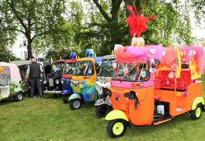 londoners ride in designer rickshaws for elephants