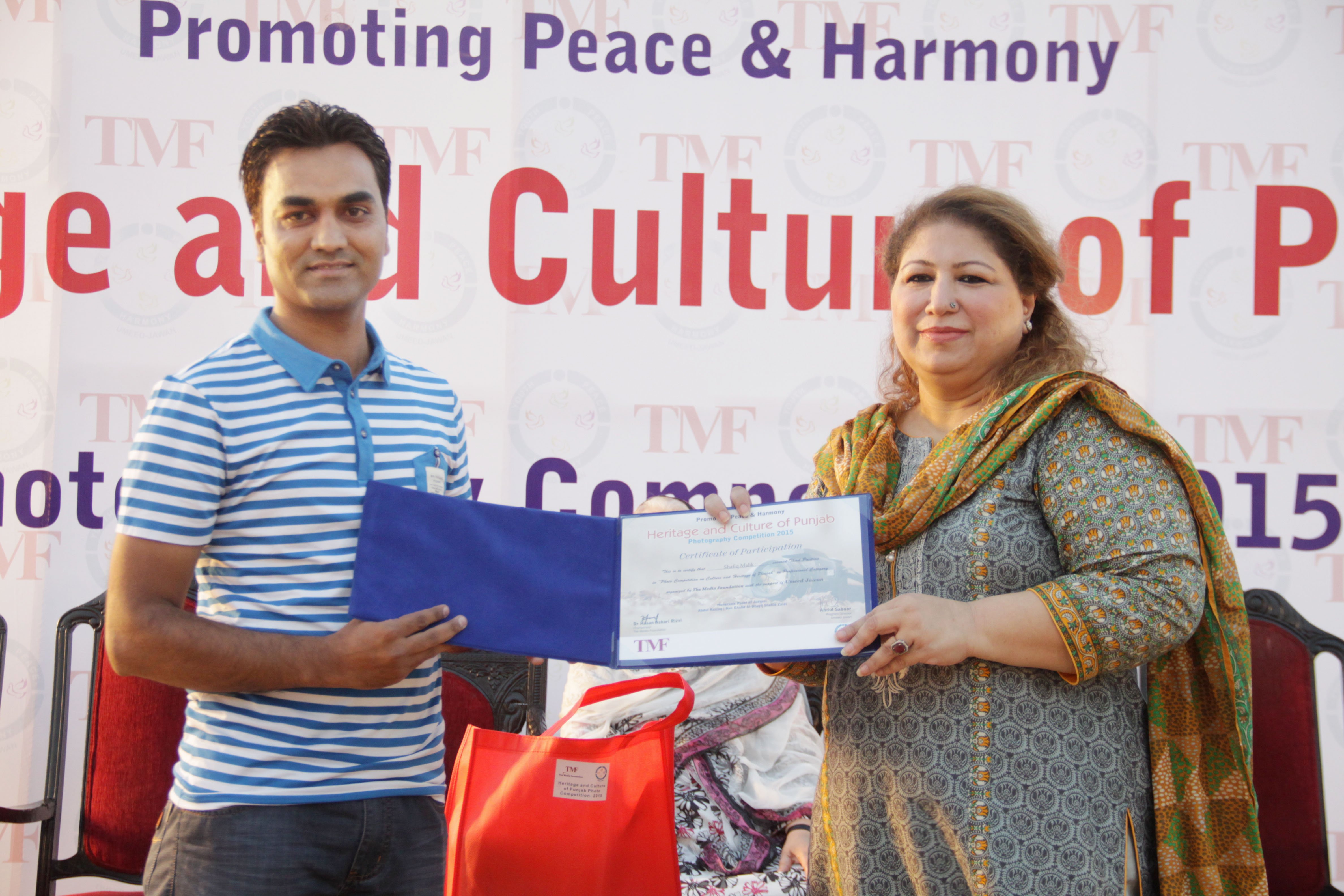 shafiq malik receives the third prize in the professional category of the heritage and culture of punjab photography competition photo abid nawaz express