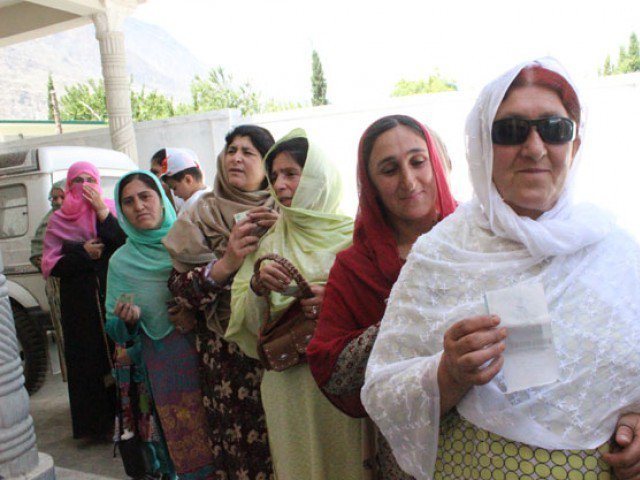 female voters standing in a que to cast their during during the elections in gilgit baltistan photo shabbir mir express