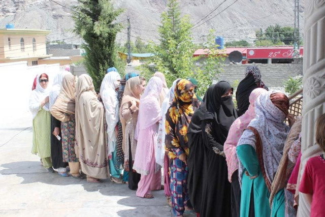 women queuing up to vote during legislative assembly elections in g b photo file women queuing up to vote during legislative assembly elections in g b photo file