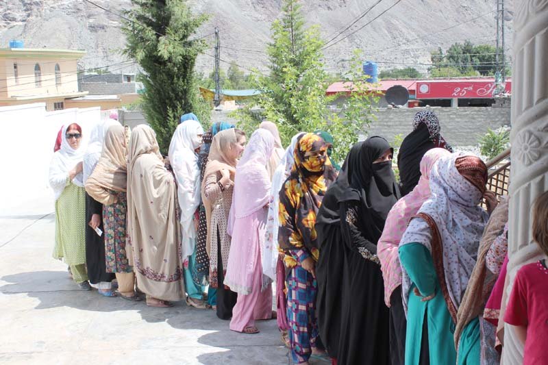 women queuing up to vote during legislative assembly elections in g b photo file