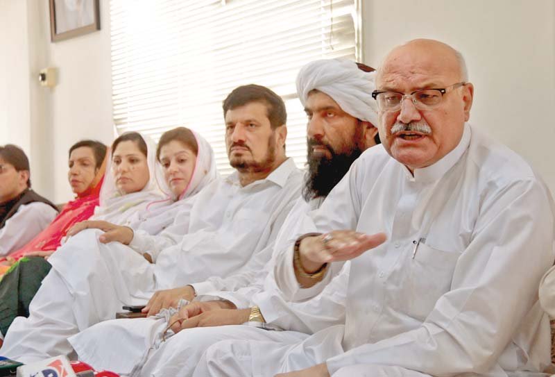 mian iftikhar addresses journalists at a news conference at bacha khan markaz photo muhammad iqbal express