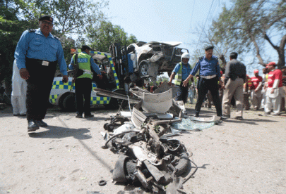 two police officials killed five injured in peshawar blast two police officials killed five injured in peshawar blast