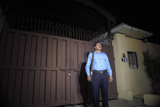 a policeman stands guard outside the office of the international charity save the children sealed by order of authorities in islamabad on june 11 2015 photo afp a policeman stands guard outside the office of the international charity save the children sealed by order of authorities in islamabad on june 11 2015 photo afp