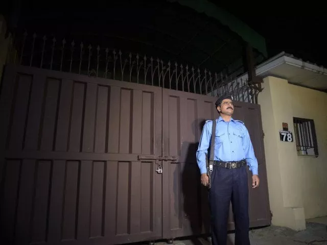 news cameramen take footage of the office of the international charity 039 save the children 039 sealed by order of authorities in islamabad on june 11 2015 as a policeman stands guard outside the building photo afp news cameramen take footage of the office of the international charity 039 save the children 039 sealed by order of authorities in islamabad on june 11 2015 as a policeman stands guard outside the building photo afp