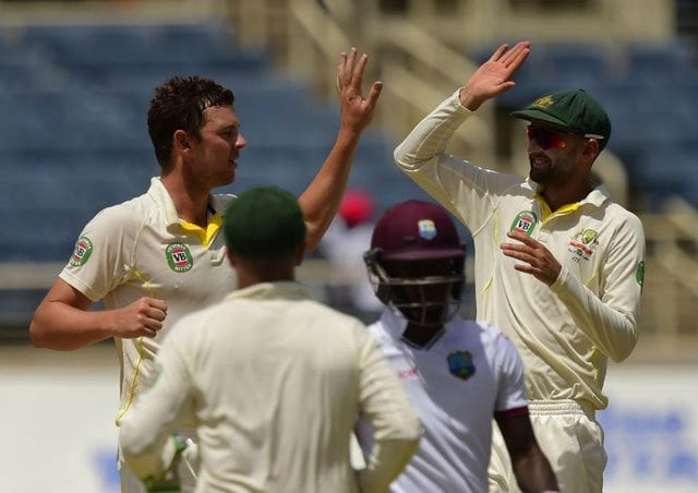 australia 039 s josh hazlewood l celebrates with teammate nathan lyon r after taking the wicket of west indies 039 jermaine blackwood on day four of their second cricket test june 14 2015 in kingston jamaica photo afp australia 039 s josh hazlewood l celebrates with teammate nathan lyon r after taking the wicket of west indies 039 jermaine blackwood on day four of their second cricket test june 14 2015 in kingston jamaica photo afp