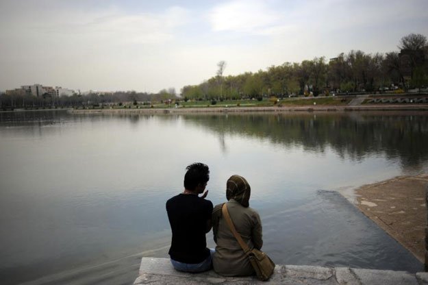 many young iranians cite the country 039 s strict social mores and pressure to get married as a heavy burden photo afp