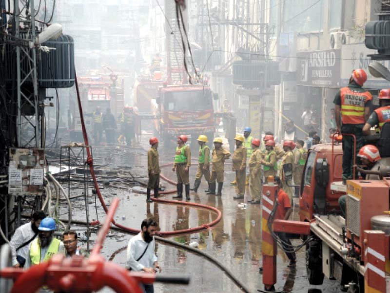 rescue teams at the site of fire photo tariq hassan express
