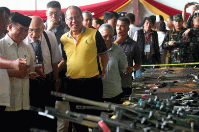 philippine muslim rebels hand over weapons in push for peace