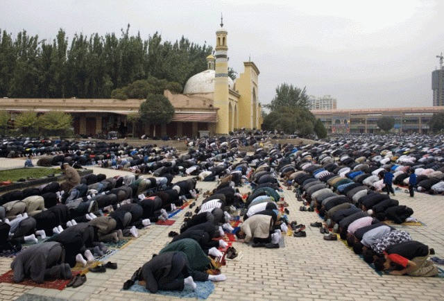 uyghur muslims gather to pray at the grand mosque of kashgar in china 039 s xinjiang region at the end of ramazan aug 31 2011 photo afp uyghur muslims gather to pray at the grand mosque of kashgar in china 039 s xinjiang region at the end of ramazan aug 31 2011 photo afp
