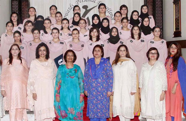 fatima jinnah women university vice chancellor samina amin qadir with graduating students and faculty member at the gradution ceremony of paf finishing school photo nni