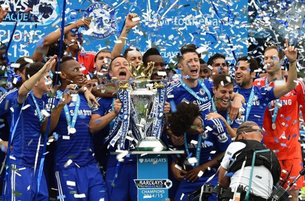 chelsea defender john terry c holds up the premier league trophy during the presentation at stamford bridge in west london photo afp