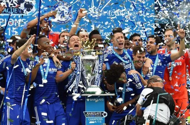 chelsea defender john terry c holds up the premier league trophy during the presentation at stamford bridge in west london photo afp chelsea defender john terry c holds up the premier league trophy during the presentation at stamford bridge in west london photo afp