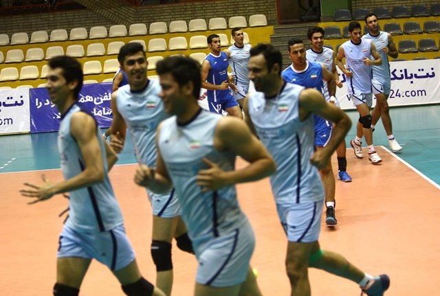 a file picture taken on july 8 2014 shows iran 039 s volleyball national team players warming up during a training session at azadi sports hall in tehran a ban on women attending iran 039 s male volleyball internationals against the united states has triggered a debate about their role in society a sensitive topic in the islamic republic photo afp