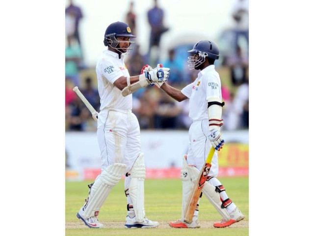 silva and sangakkara s partnership helped sri lanka into a strong position at the end of day two but their run rate of less than three was on the slower side photo afp silva and sangakkara s partnership helped sri lanka into a strong position at the end of day two but their run rate of less than three was on the slower side photo afp