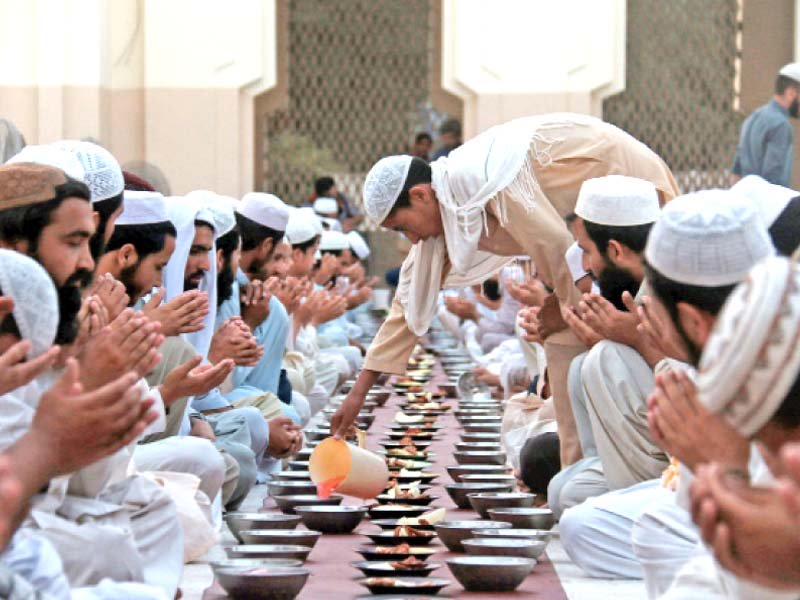 people break their fast at a mosque in saddar photo express