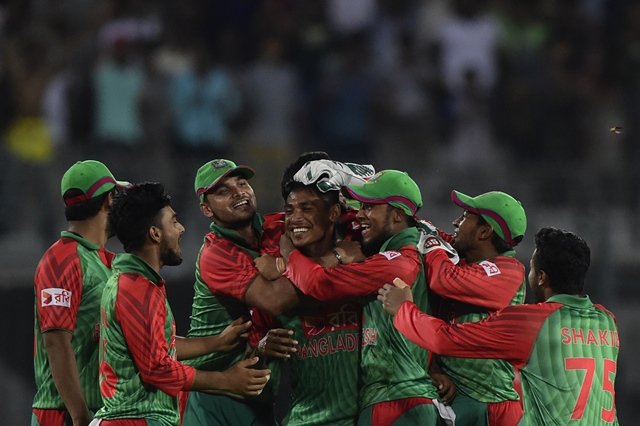 bangladesh cricketer mustafizur rahman c celebrates with teammates after the dismissal of the indian cricketer ravindra jadeja during the first one day international odi cricket match between bangladesh and india at the sher e bangla national cricket stadium in dhaka on june 18 2015 photo afp