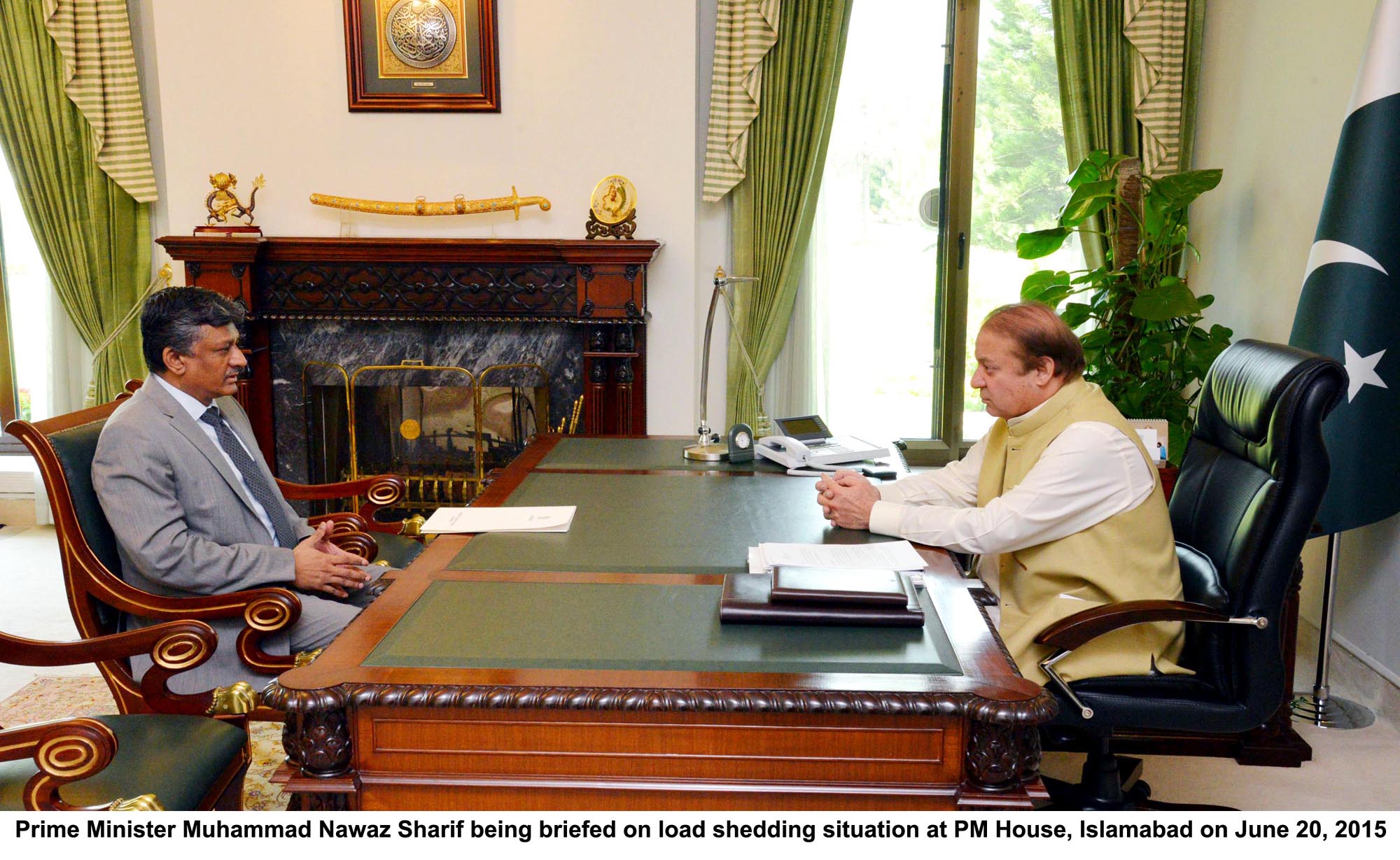 prime minister nawaz sharif in a meeting with water and power secretary younus dagha at the pm house on saturday photo pid