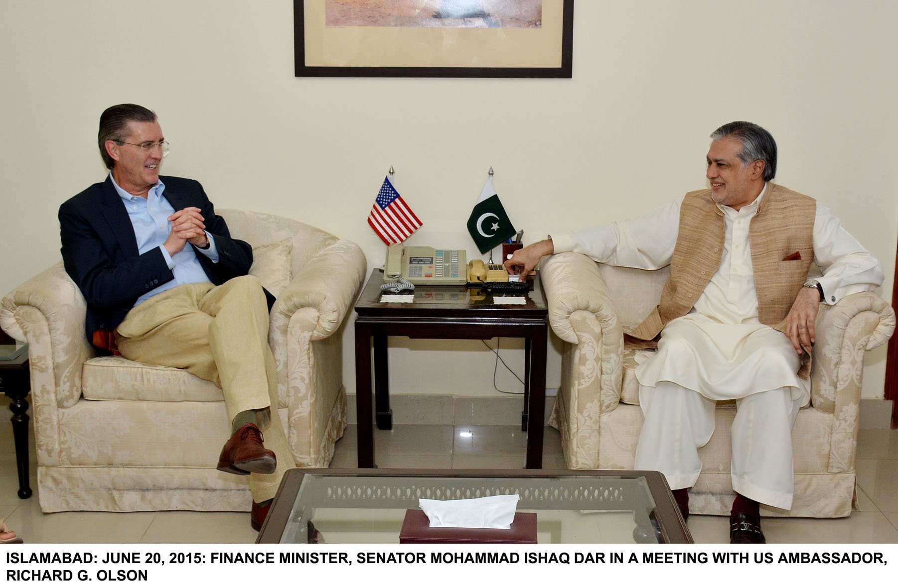 finance minister ishaq dar r speaks with us ambassador richard olson on saturday photo pid