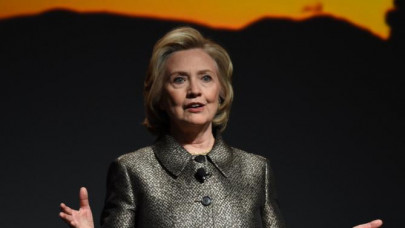 clinton backs stiffer gun laws after us church bloodbath