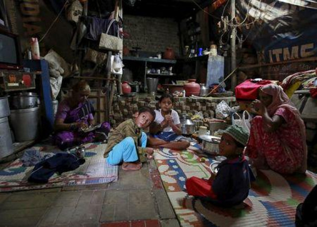 family members of mehboob sheikh 45 who died after consuming bootleg liquor sit inside their house at a slum in mumbai india june 20 2015 photo reuters family members of mehboob sheikh 45 who died after consuming bootleg liquor sit inside their house at a slum in mumbai india june 20 2015 photo reuters