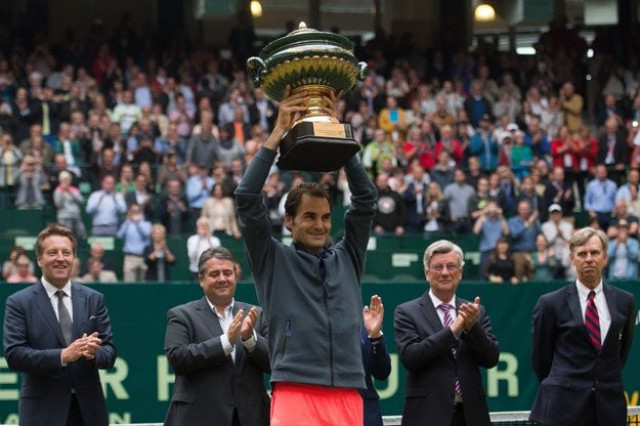 switzerland 039 s roger federer celebrates with the trophy after the final match against italy 039 s andreas seppi at the atp gerry weber open in halle western germany on june 21 2015 photo afp switzerland 039 s roger federer celebrates with the trophy after the final match against italy 039 s andreas seppi at the atp gerry weber open in halle western germany on june 21 2015 photo afp