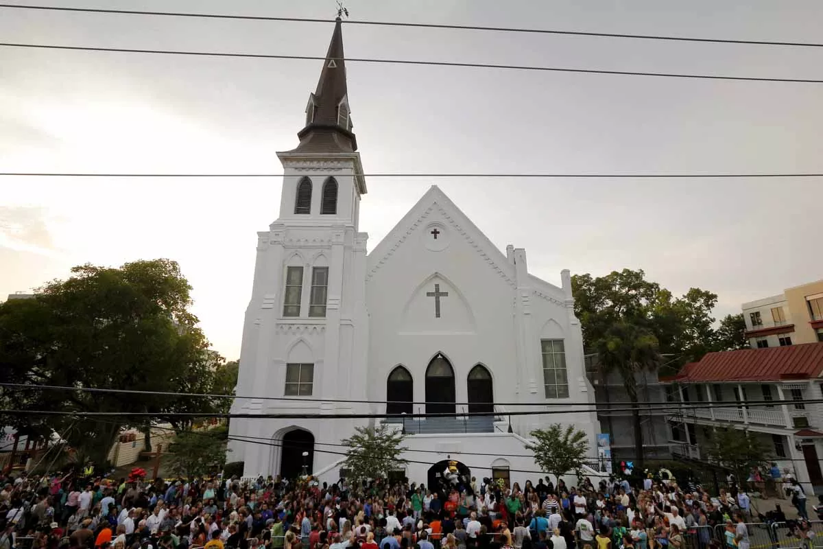 a crowd gathers outside the emanuel african methodist episcopal church following a prayer vigil nearby in charleston south carolina june 19 2015 photo reuters a crowd gathers outside the emanuel african methodist episcopal church following a prayer vigil nearby in charleston south carolina june 19 2015 photo reuters