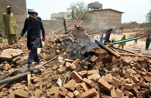 a survey of damaged houses is under way in the area where displaced people are being repatriated photo afp file a survey of damaged houses is under way in the area where displaced people are being repatriated photo afp file