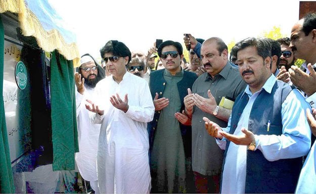 federal minister for interior and narcotics control ch nisar ali khan inaugurating the project of rehabilitation of airport road photo app