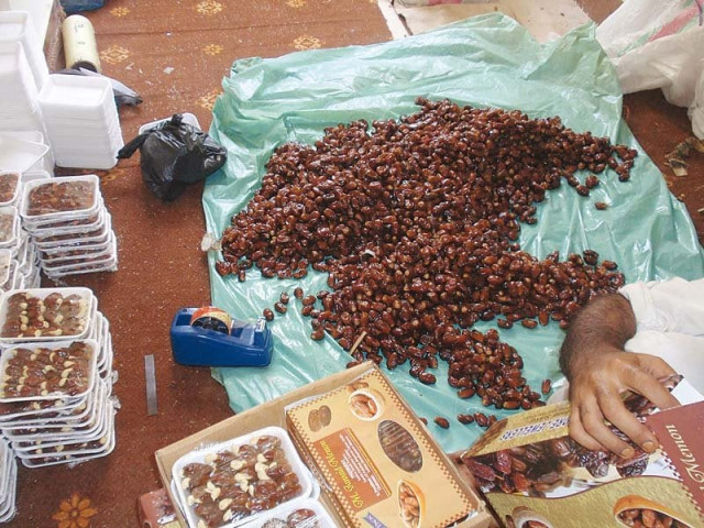 vendors lay out dates at the ramazan bachat bazaar set up by the sukkur small traders daily commodities are being sold 20 to 30 per cent cheaper here than in the open market photo express vendors lay out dates at the ramazan bachat bazaar set up by the sukkur small traders daily commodities are being sold 20 to 30 per cent cheaper here than in the open market photo express