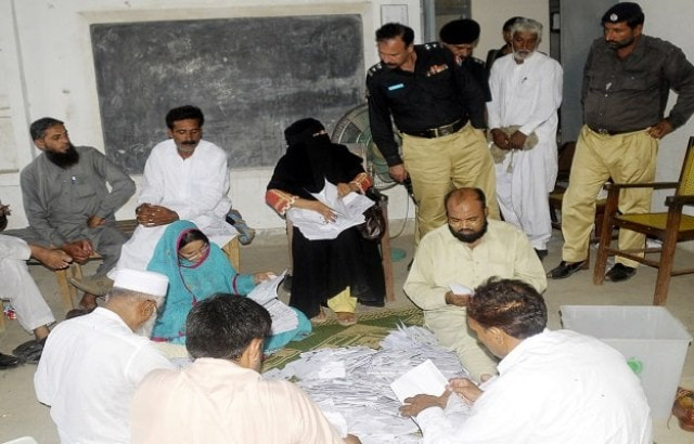 polling staff of pp 97 counting the number of votes photo express polling staff of pp 97 counting the number of votes photo express