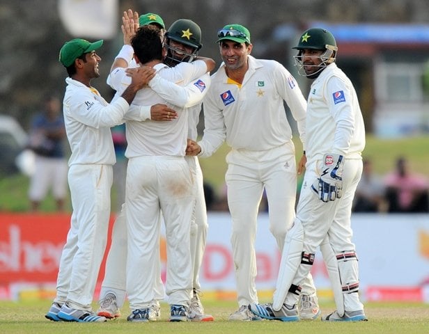 pakistan cricket team captain misbah ul haq 2r and teammates celebrate the dismissal of sri lankan cricketer kumar sangakkara during the fourth day of the opening test match between sri lanka and pakistan at the galle international cricket stadium in galle on june 20 2015 photo afp