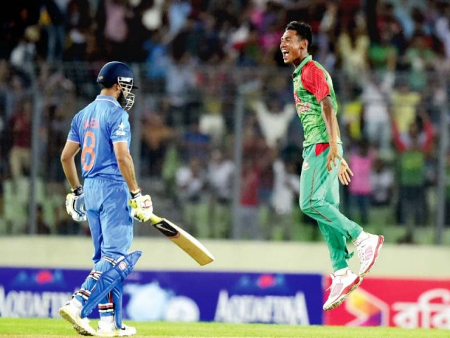mustafizur jumps in the air after dismissing ravindra jadeja on his way to a six wicket haul photo afp mustafizur jumps in the air after dismissing ravindra jadeja on his way to a six wicket haul photo afp