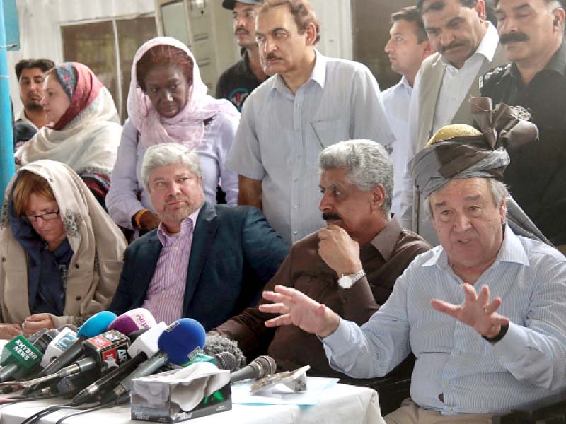 unhcr team addresses media at the unhcr centre in chamkani photo express