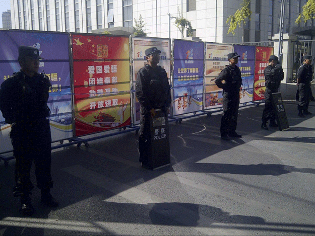 policemen in riot gear guard a checkpoint on a road near a courthouse where ethnic uighur academic ilham tohti 039 s trial is taking place photo reuters policemen in riot gear guard a checkpoint on a road near a courthouse where ethnic uighur academic ilham tohti 039 s trial is taking place photo reuters