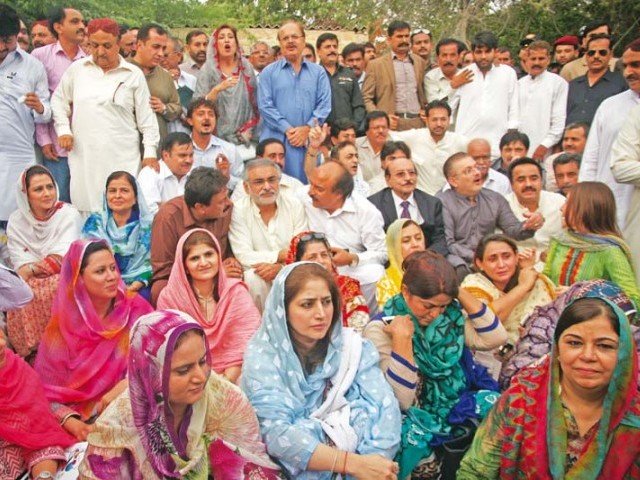 sindh chief minister qaim ali shah his cabinet members and ppp lawmakers staged a sit in against loadshedding in the city and province outside the sindh assembly on wednesday photo athar khan express