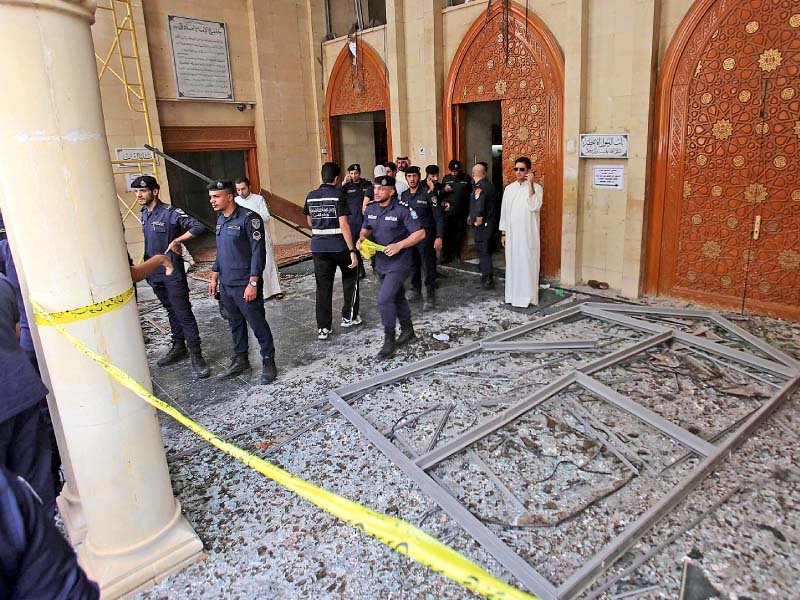 kuwaiti police cordon off the mosque after the suicide bombing photo afp