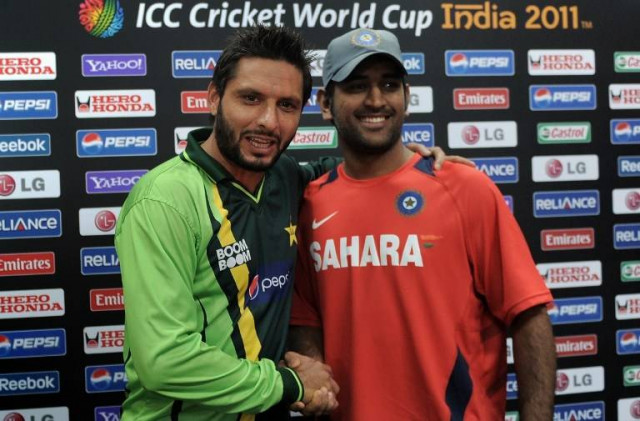 a file photo of shahid afridi and ms dhoni shaking hands at the icc cricket world cup 2011 photo file afp a file photo of shahid afridi and ms dhoni shaking hands at the icc cricket world cup 2011 photo file afp