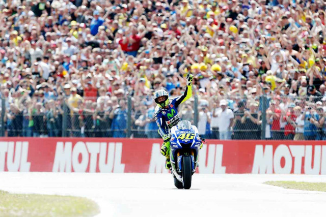 italian rider valentino rossi celebrates his victory during the dutch motogp race in assen on june 27 2015 photo afp italian rider valentino rossi celebrates his victory during the dutch motogp race in assen on june 27 2015 photo afp