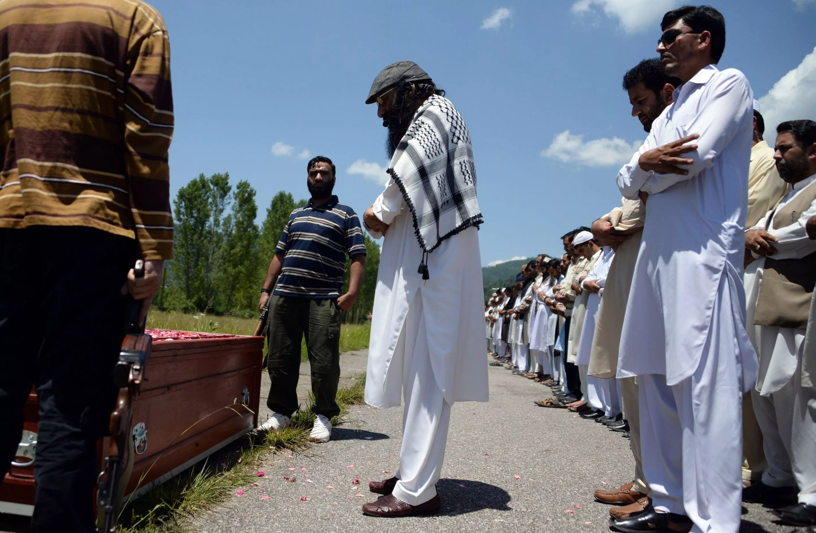 syed salahudeen leads prayers for waheed noor khan in rawalakot photo afp syed salahudeen leads prayers for waheed noor khan in rawalakot photo afp